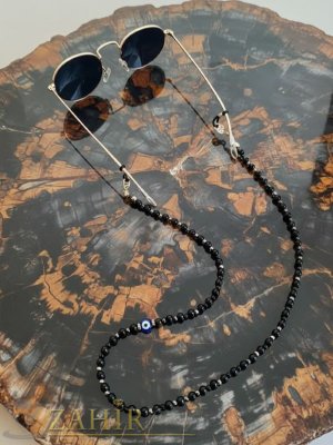  Луксозен хендмейд синджир за очила изработена от наситени черни мъниста, синьо око и фини златисти детайли, дълга 76 см - N1702